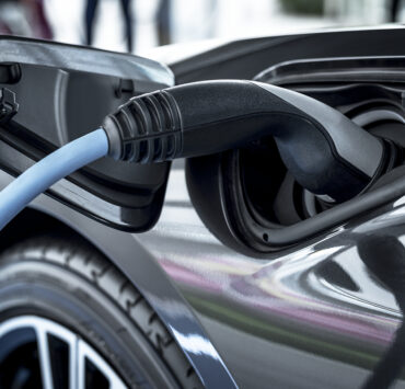 Electric car at charging station